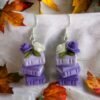 Boucles d'oreilles livres violets