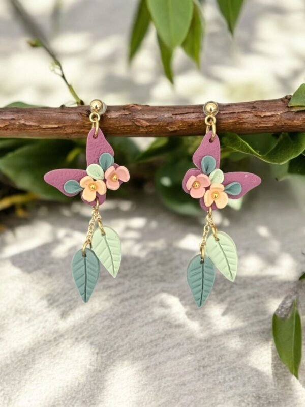 PXL_20250426_130654593.PORTRAIT (1) Boucles d'oreilles Papillons bordeaux