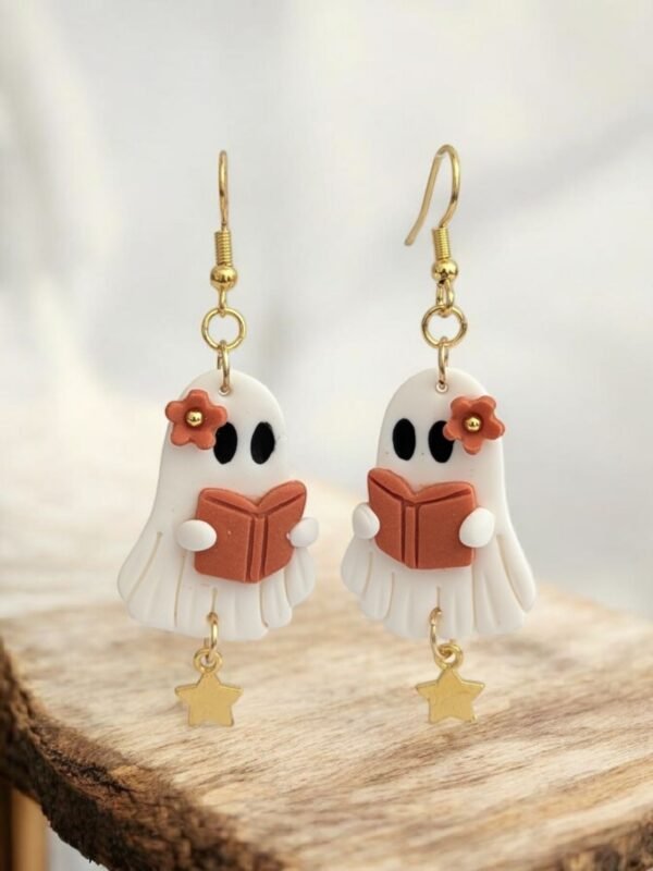 PXL_20250906_123137459.PORTRAIT Boucles d'oreille Fantôme et son livre